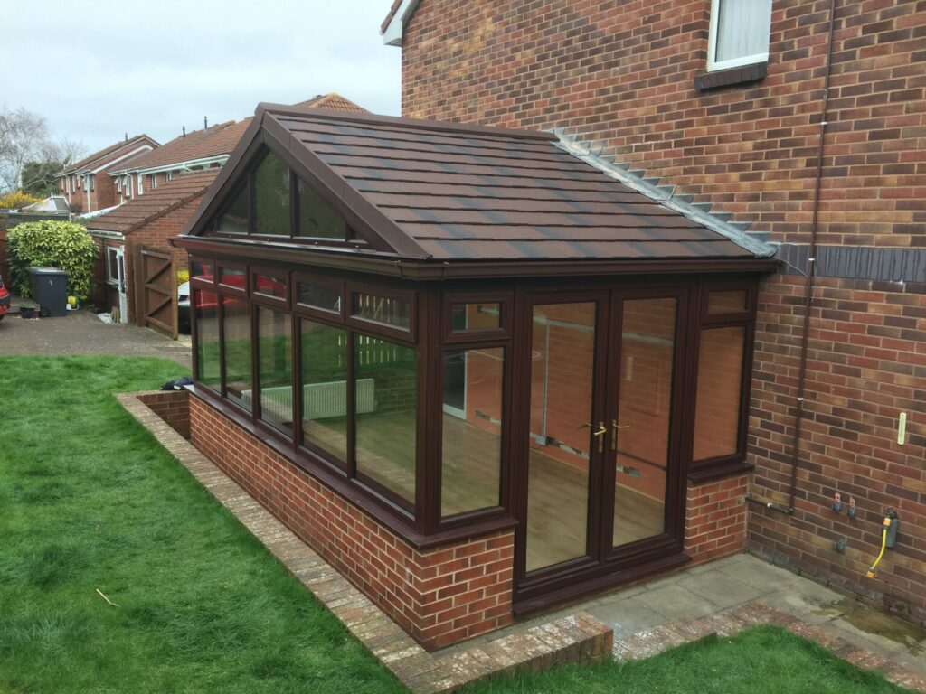 Guardian Conservatory Warm Roof with Burnt Umber Metrotiles