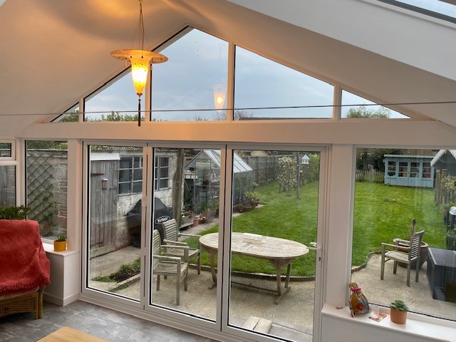 Guardian Warm Roof, Gable Style Internal Finish With Bi-Folding Doors